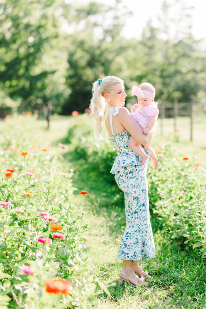 family photo shoot with zinnia flowers at piney meadow farm in huntsville texas